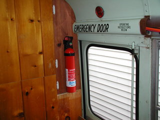 a fire extinguisher installed in a bunk room