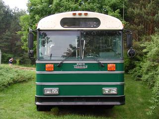The front of the bus with trim and ears