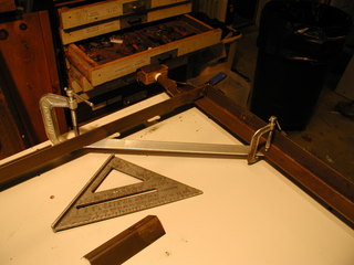 legs braced and clamped for drilling